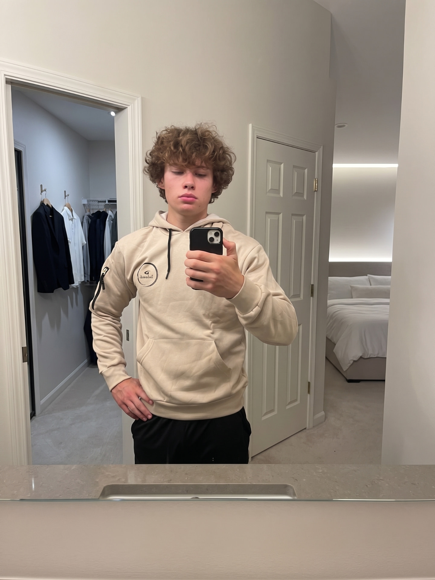 Cloud cream Sabr hoodie worn, front view